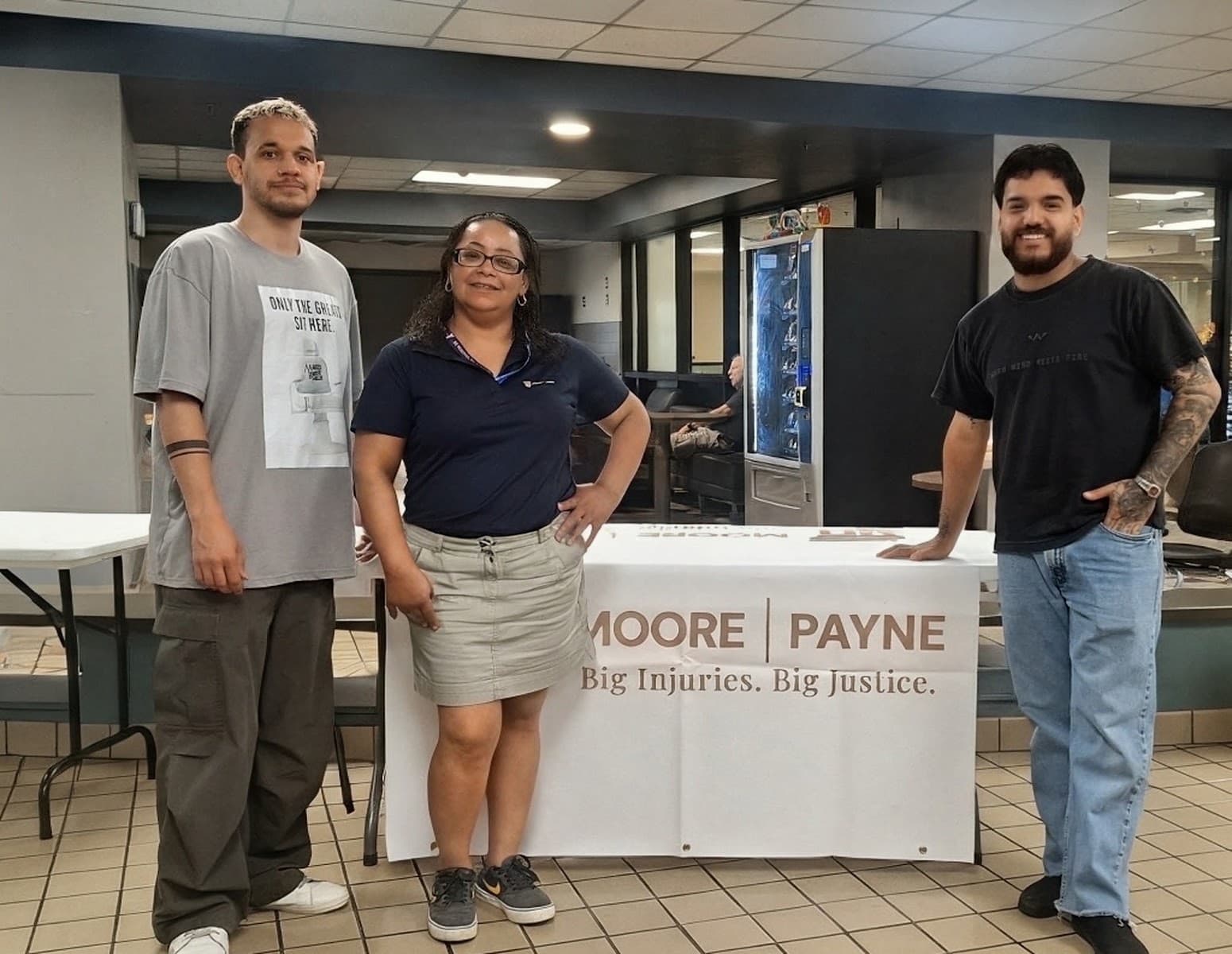 YMCA and Makk's team members with the Moore Payne Law event table